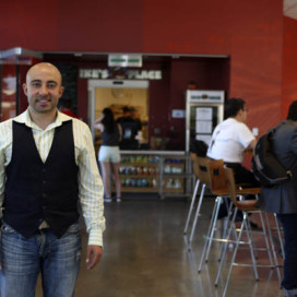 Ike Shehadeh, proprietor of Ike's Place, pictured in 2012 prior to the restaurant's closure in Spring 2014. (KEVIN TSUKII/The Stanford Daily)