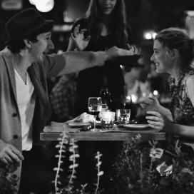 Greta Gerwig with Adam Driver having dinner in "Frances Ha." Copyright Pine District, LLC.