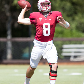 Senior Kevin Hogan (8) leads an experienced Cardinal squad that hopes to reach the first ever College Football Playoff this season. (TRI NGUYEN/The Stanford Daily)