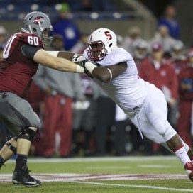 Defensive tackle Ikenna Nwafor (right) will likely take a medical retirement, head coach David Shaw said on Monday. (STEPHEN BRASHEAR/isiphotos.com)