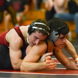 Senior Evan Silver (left) made his season debut on Saturday against Northwestern and notched a major decision over Garrison White. (RAHIM ULLAH/The Stanford Daily)