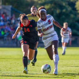 Senior forward Chioma Ubogagu (right) notched a second-half hat trick as the top-seeded Cardinal roared back from an early 2-0 deficit to roll over Cal State Fullerton by a score of 5-2.  (ROGER CHEN/The Stanford Daily)