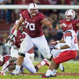 Junior left tackle Andrus Peat (center) announced on Tuesday that he would leave school early and enter the NFL Draft. (JIM SHORIN/StanfordPhoto.com)