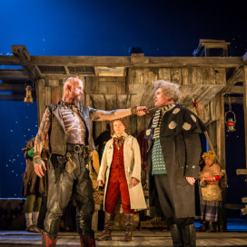 l-r AIDAN KELLY (Bill Bones), HELENA LYMBERY (Dr Livesey) and NICK FLETCHER (Squire Trelawney). Photo by Johan Persson courtesy of National Theatre