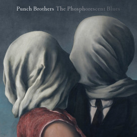 The album artwork features René Magritte's iconic 'The Lovers II.' Courtesy of Nonesuch Publicity.