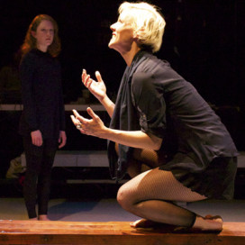 Antigone (r, Madeline H.D. Brown) argues against her sister, Ismene (l, Hannah Donovan). Photo by Chase Ramsey, courtesy of Cutting Ball Theater.