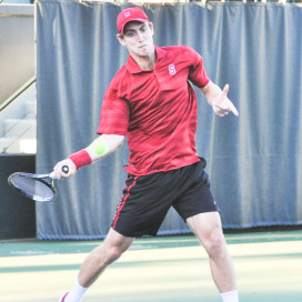 Senior John Morrissey's three-set win over USC's No. 19 Roberto Quiroz clinched Stanford's 4-3 upset victory over the No. 5 Trojans on Saturday. (RAHIM ULLAH/The Stanford Daily)