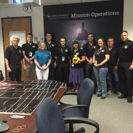 Ivan Linscott (left) and New Horizons Mission Operations team gathered at NASA's Mission Operations Center on the evening that the spacecraft passed Pluto.
(Courtesy of Ivan Linscott)