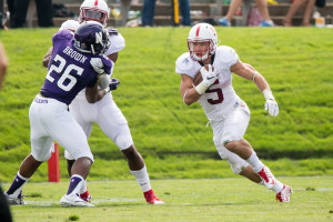 Sophomore Christian McCaffrey (right) was Stanford's leading rusher with 68 yards. Although McCaffrey and the Stanford offense moved the ball well on their first drive, they didn't see any more success until the fourth quarter. (BOB DREBIN/isiphotos.com)