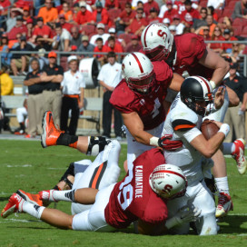 Despite being the most prolific passer in Oregon State history, quarterback Sean Mannion (middle right) struggled against Stanford, throwing for 393 yards and only one TD in his two losses to the Cardinal. True freshman Seth Collins has replaced Mannion under center this year. (ERIN ASHBY/The Stanford Daily)