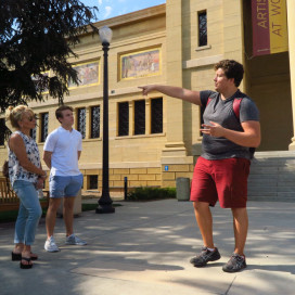 Tour guide Kyle Efken '17 introduces visitors to the Cantor Arts Center. (NINA ZUBRILINA/The Stanford Daily)