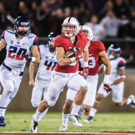 Sophomore running back Christian McCaffrey (center) scored the first rushing touchdown of his career as part of a 156-yard rushing performance against Arizona, his third consecutive game of over 100 yards rushing. Remound Wright added three touchdowns and Barry Sanders also found the end zone as Stanford rolled, 55-17. (SAM GIRVIN/The Stanford Daily)