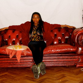English rapper Little Simz, holding down the throne.  (Theirnewreligion, Wikimedia Commons)