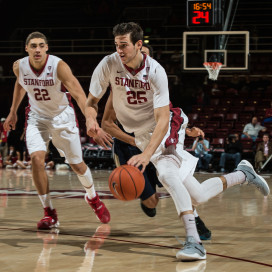 Rosco Allen (right) scored a career-high 25 points and 9 rebounds in Stanford's stunning come-from-behind victory over Arkansas, in which the team scored 21 of the game's final 22 points to win by three. (BILL DALLY/stanfordphoto.com)