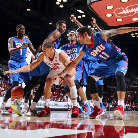 Amidst some uncertainty in the starting lineup and in who head coach Johnny Dawkins can play, due to several preseason injuries, sophomore post Reid Travis (center) has been a consistent contributor, averaging 14.8 points per game and shooting 65 percent from the field. (BOB DREBIN/isiphotos.com)