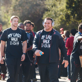 Every year, Stanford's seniors do their "Last Walk" ahead of their Senior Day celebration in their final game at Stanford Stadium. David Parry (right) leads last year's senior class in the Last Walk ahead of the Utah game a year ago. (DAVID ELKINSON/stanfordphoto.com)