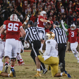 Stanford celebrates on the field after senior kicker Conrad Ukropina's kick from 45 yards perfectly split the uprights, giving Stanford a thrilling 38-36 win over Notre Dame in a back-and-forth duel that featured career nights from Kevin Hogan and Devon Cajuste in their home finale. (SAM GIRVIN/The Stanford Daily)