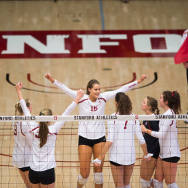 Stanford's three seniors, Brittany Howard (center), Madi Bugg (second from left) and Jordan Burgess (far right), closed their home careers with a bang in a 3-1 win over California in the Big Spike on Wednesday. They became just the second senior class in the last 15 years to go undefeated against Cal in conference play over four full seasons. (RAHIM ULLAH/The Stanford Daily)