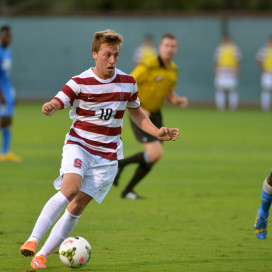 Sophomore Corey Baird (above) is tied for seventh in the nation with 11 assists in the team's 21 games. His most recent assist came in the Cardinal's last game against Wake Forest, when he sent a free kick towards classmate Foster Langsdorf, who headed the ball into the goal, sealing the win for Stanford and sending the team to the College Cup for the first time since 2002. (SAM GIRVIN/The Stanford Daily)