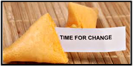 image of a fortune cookie breaken in two, the paper revealing 'Time for Change'