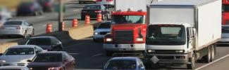 Trucks and cars driving on a highway