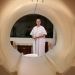 photo of patient and MRI machine