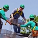 workers installing a solar panel