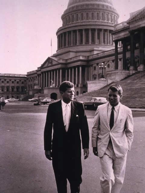 President Kennedy walks from the U.S. Capitol with his brother, Attorney General Robert F. Kennedy