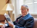 Former Vice President Walter Mondale reviews the ceremony's program before discussing the legacy of Gideon v. Wainwright.