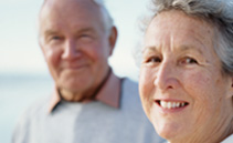 photo of woman and man smiling for camera