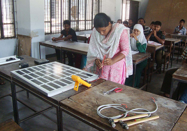 <p>Receiving training in installing and servicing solar home systems. Photo by ILO/Alan Dow/BMET</p>
