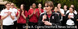 Cardinal women's basketball coach Tara VanDerveer speaking at a rally outside Maples Pavilion in 2010