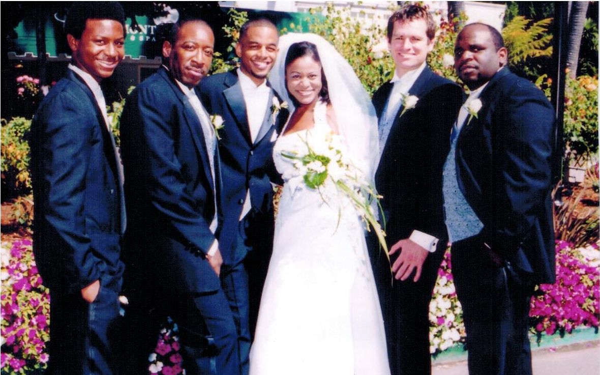 Carla Pugh and her husband Joseph Towles (third from left) on their wedding day, April 16, 2003.