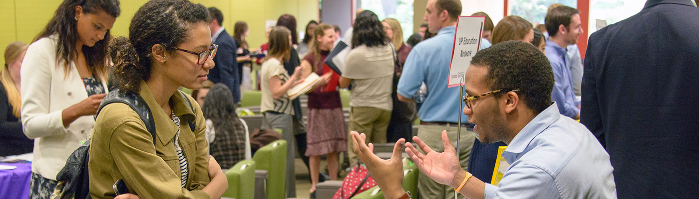 Photo of Students and Employers at Career Fair