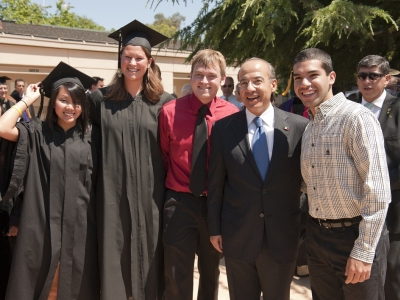 President Calderon with students at Commencement, 2011