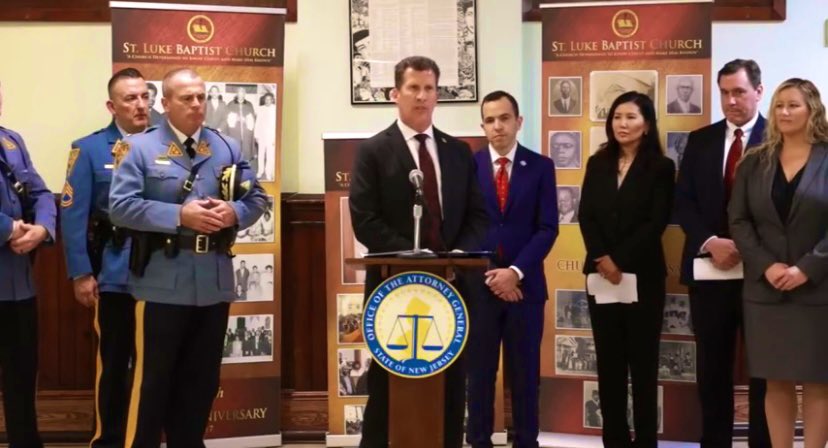 Bureau of Alcohol, Tobacco, Firearms and Explosives Acting Special Agent in Charge Bryan Miller at a podium during press conference. Other law enforcement officials to his left and right. 

15 Alleged Members of a Paterson Gun Trafficking Ring Charged with Transporting Guns from South Carolina for Illegal Sale in NJ. Proud to have protected the public with great partners @NewJerseyOAG @NJSP NJ DCJ. #NoBetterPartner