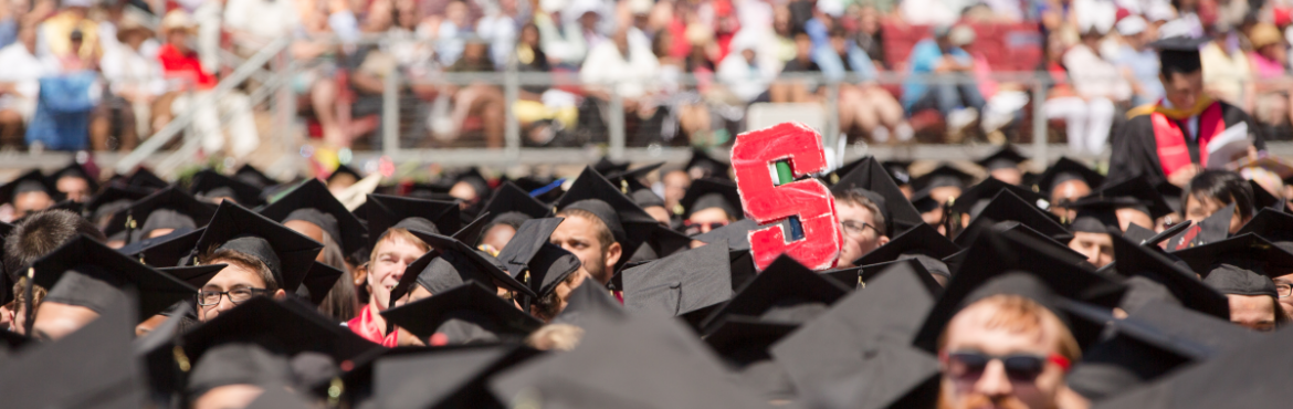 Students and the Stanford S at commencement