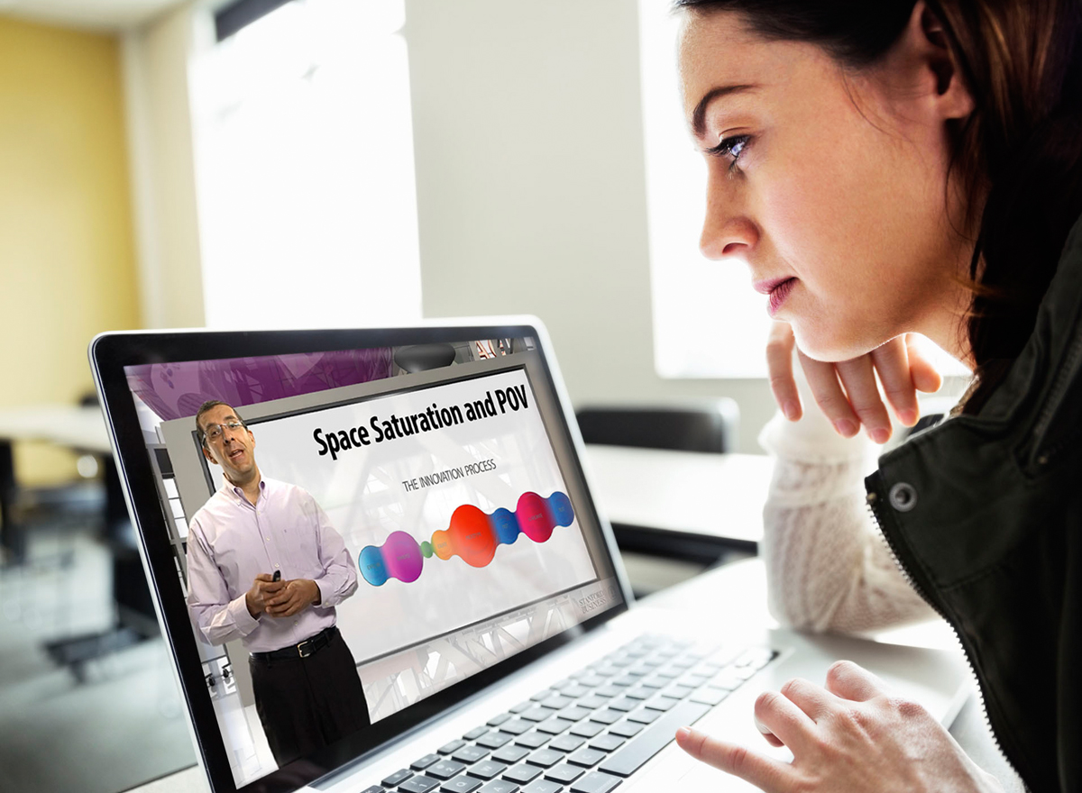 Woman looking at laptop screen