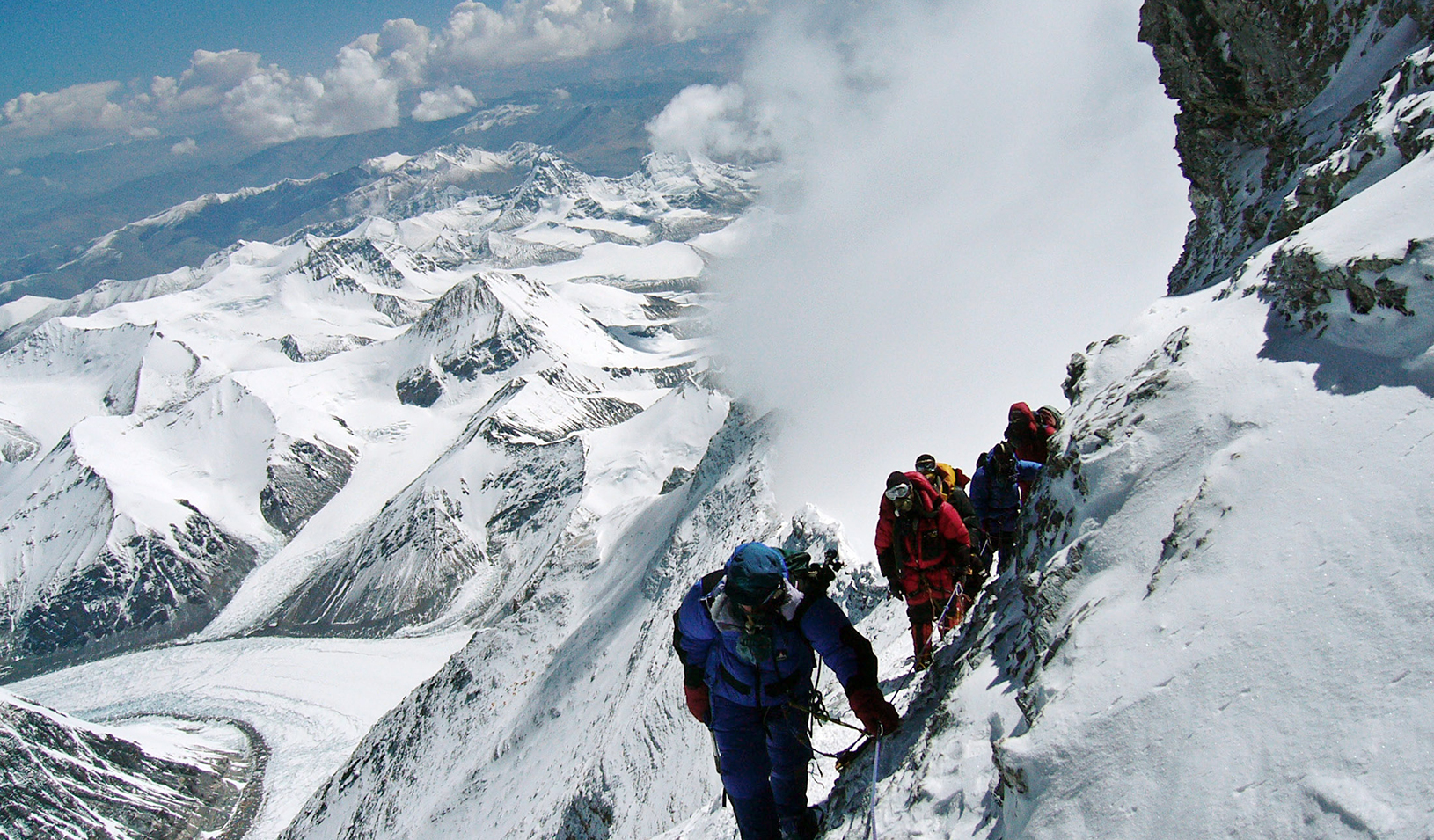 Mountain climbers on a treacherous path | Reuters/Stringer