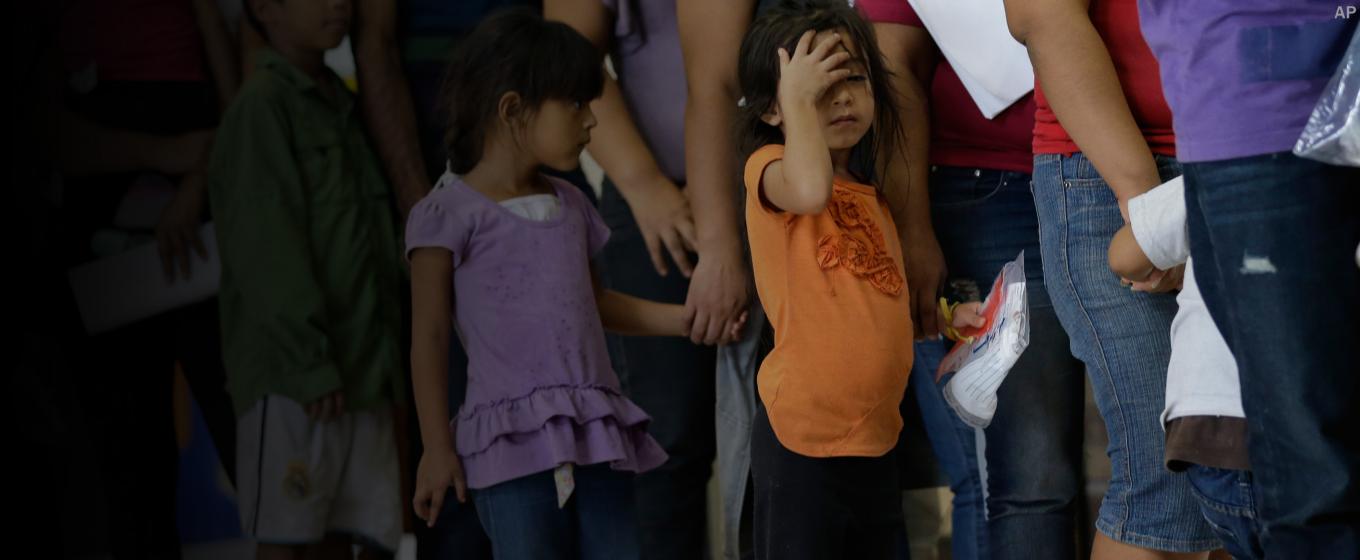 Refugee families standing in line