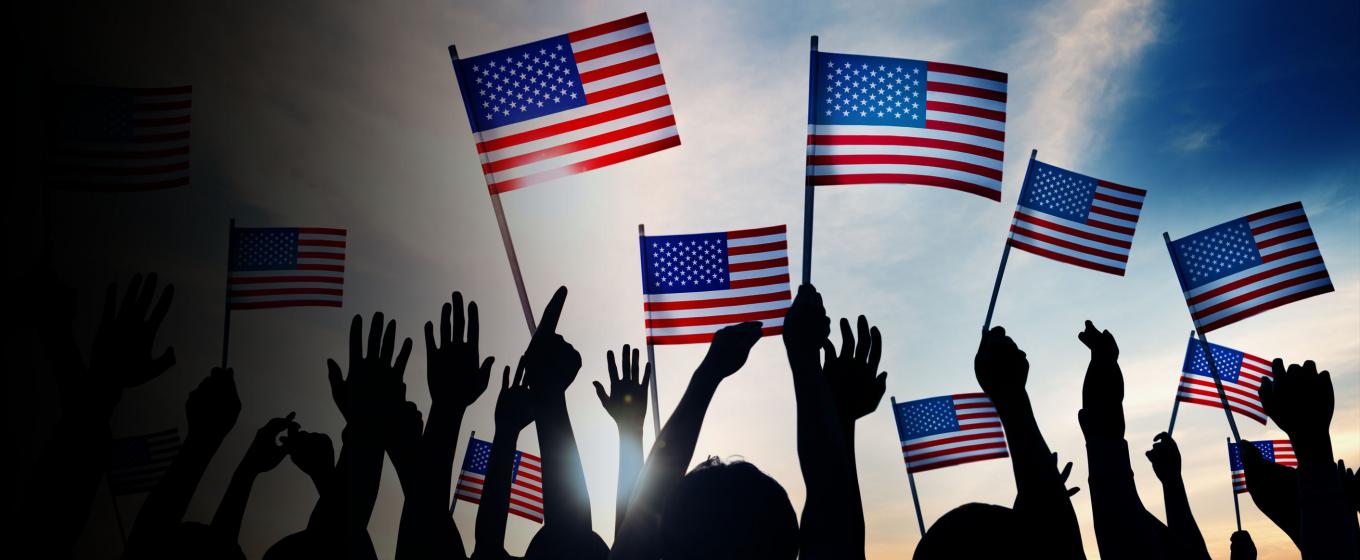 People waving American flags.