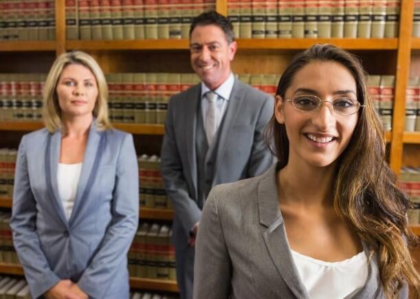 three people in law library