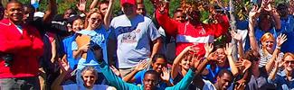 A group of people who have volunteered for a cleanup project in their community