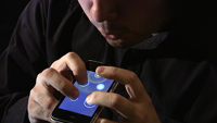 Ge plays Ocarina on an 
iPhone