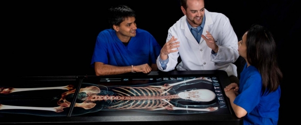 Medical students using digital table