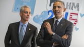 Chicago Mayor Rahm Emanuel listens as President Barack Obama speaks on behalf of Emanuel during a campaign stop in Chicago, Thursday, Feb. 19, 2015. Officially, President Barack Obama came home to Chicago on Thursday to designate a new national monument. But you'd be forgiven for mistaking the visit for a campaign event for Chicago Mayor Rahm Emanuel. (AP Photo/Evan Vucci)