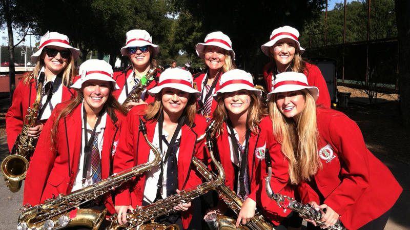 Sailing captain Haley Kirk (top row, second from right) and her friends in their LSJUMB attire