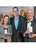 Sylvia Thompson (left), Estonian Ambassador to the US Eerik Marmei (center), and Michael Keller (right) during the presentation of awards ceremony.