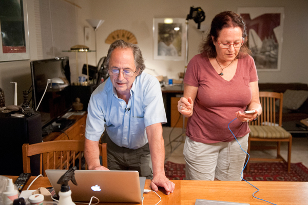 Levitt and his wife, Rina, answer emails and phone calls from friends.