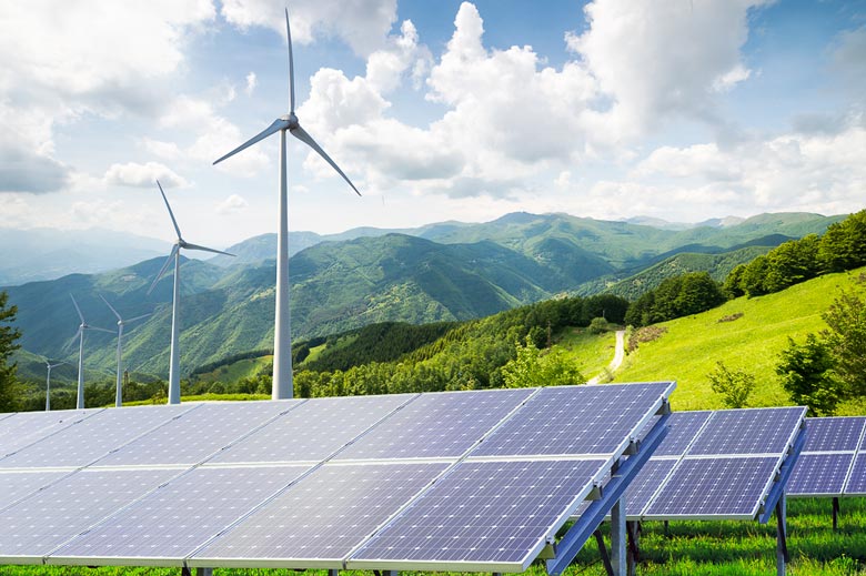 solar panels and wind turbines / genuisksy/Shutterstock